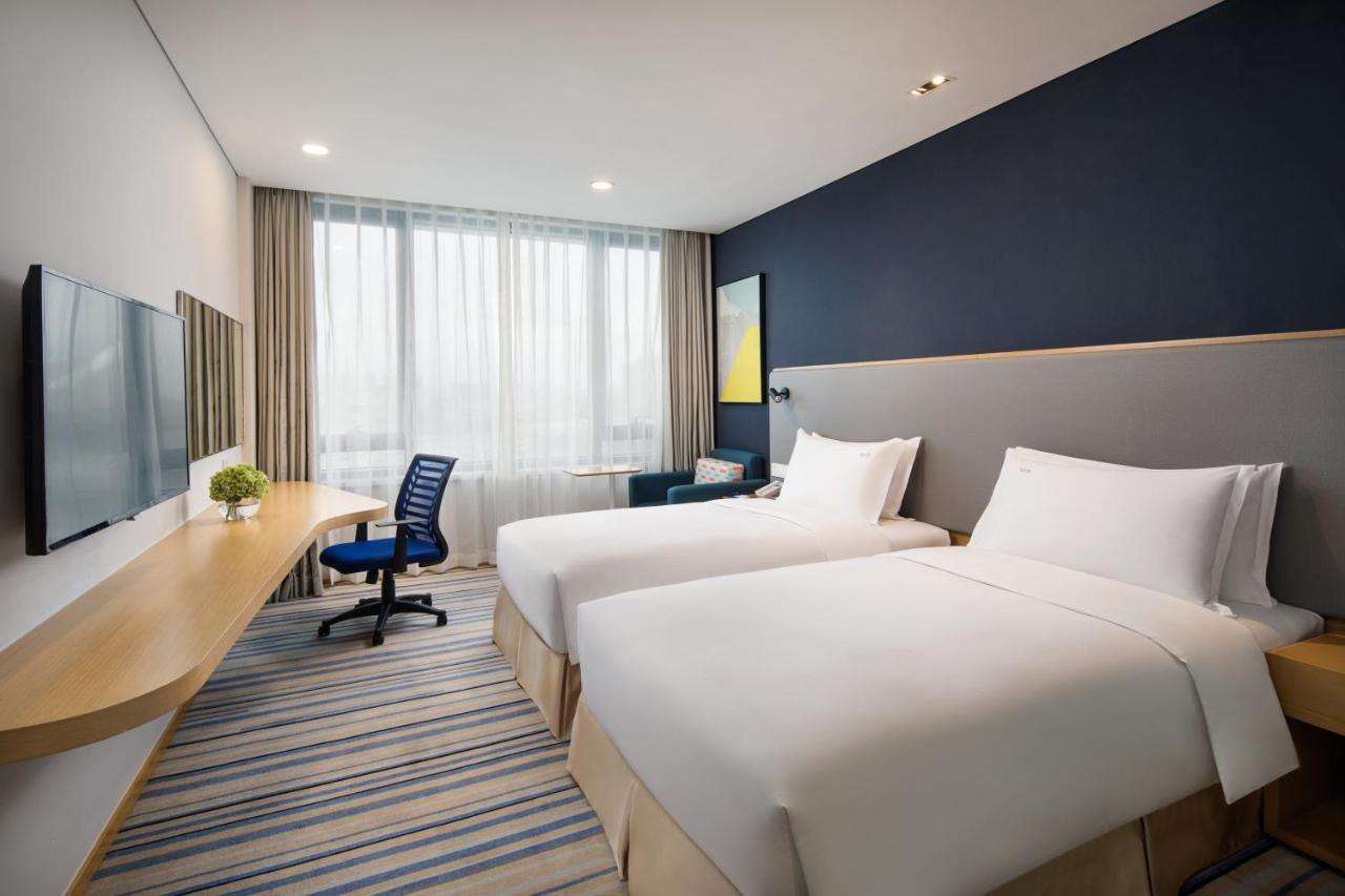 Holiday Inn Express Wuxi Taihu New City By Ihg Экстерьер фото
